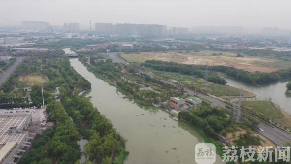 以水为媒两岸拂绿 经纬间打造城区“生态绿肺”